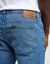 Spodnie Jeansowe Męskie Lee Rider Worn In Cody L701NLLT 112144379